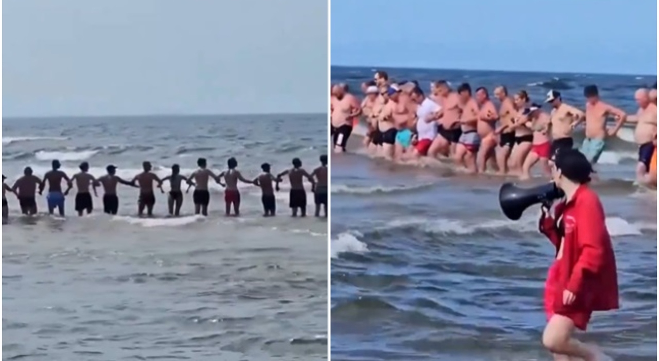 https://statics.cedscdn.it/photos/MED_HIGH/2026/08/07/9695909_07151313_catena_umana_spiaggia.jpg