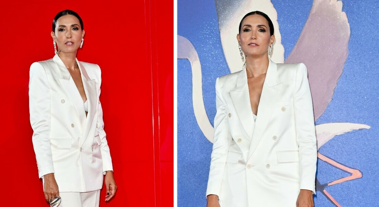 https://statics.cedscdn.it/photos/MED_HIGH/2026/09/06/9747109_06140452_caterina_balivo_venezia_82_completo_bianco_look_foto.jpg