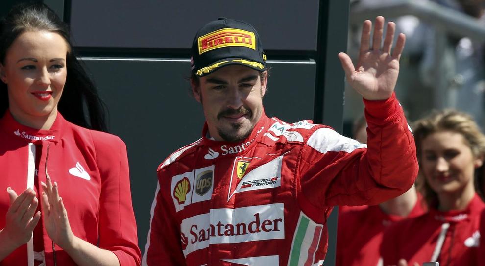 Fernando Alonso con la tuta della Ferrari