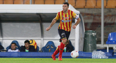 Captain Fabio Lucioni (US Lecce) raises the cup to the sky for the