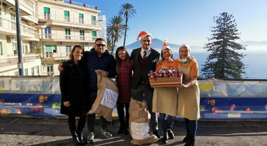 Missione Sorriso i dipendenti Thun vestiti da Babbo Natale all