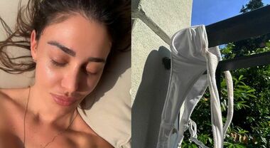 Belen, primo topless della stagione. Il dettaglio hot scatena i ...