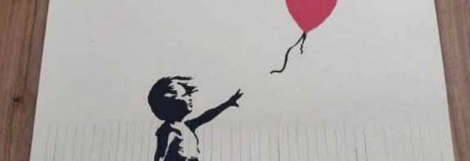 Fa a striscioline stampa di Banksy da 40mila sterline per aumentarne il valore: ora vale un pound Fa a striscioline stampa di Banksy da 40mila sterline per aumentarne il valore: ora vale un pound