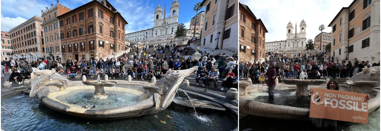 Roma, blitz degli attivisti a piazza di Spagna: versata vernice nera nella fontana della Barcaccia
