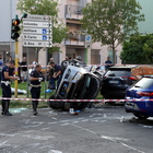 Incidente a Milano, l'auto si ribalta e investe due pedoni (Fotogramma)