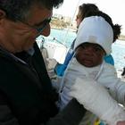 • Favor, la bimba arrivata a Lampedusa completamente sola 