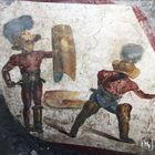 Pompei, nuova eccezionale scoperta: ritrovato l'affresco dei Gladiatori Combattenti