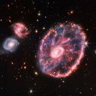 Nasa, il telescopio Webb svela la "Galassia Ruota di Carro"