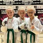 Gemelline di 8 anni oro, argento e bronzo nel Taekwondo: «La Nazionale nel futuro di Flavia, Francesca e Fabiola»