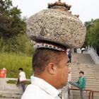 Il cinese a dieta con la pietra sulla testa
