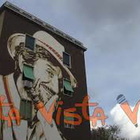 Il gigantesco murale dedicato a Gigi Proietti al Tufello