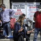Commercianti in piazza a San Pietro