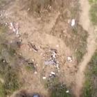 Il drone tra i resti dell'elicottero precipitato