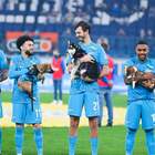 I giocatori dello Zenit in campo con in braccio cuccioli da adottare: l'iniziativa attesa anche in Serie A
