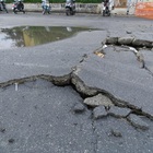 Maltempo, saltato completamente l’asfalto in via Battistini (foto Daniele Leone/Ag.Toiati)