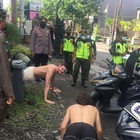 Turisti sorpresi senza mascherina, a Bali la multa insolita: costretti a fare 50 flessioni VIDEO